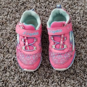 pink with lights and nike snickers